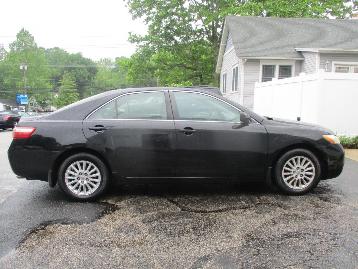 2007 BLACK Toyota Camry LE V6 (4T1BK46KX7U) with an 3.5L V6 DOHC 24V engine, 6-Speed Automatic Overdrive transmission, located at 540a Delsea Drive, Sewell, NJ, 08080, (856) 589-6888, 39.752560, -75.111206 - Photo#9